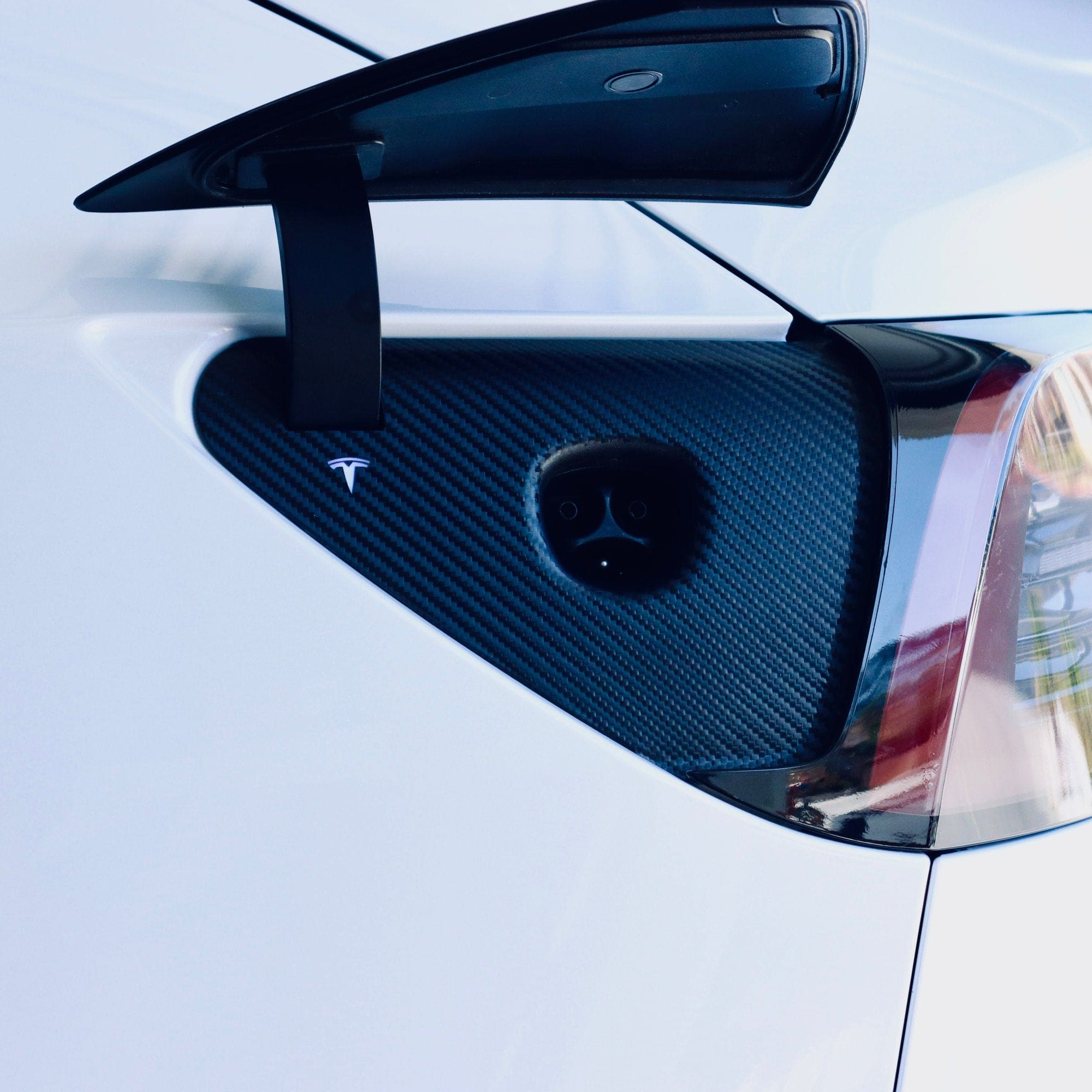 white car carbon fiber spoiler charge port tesla model avery dennison ev accessories