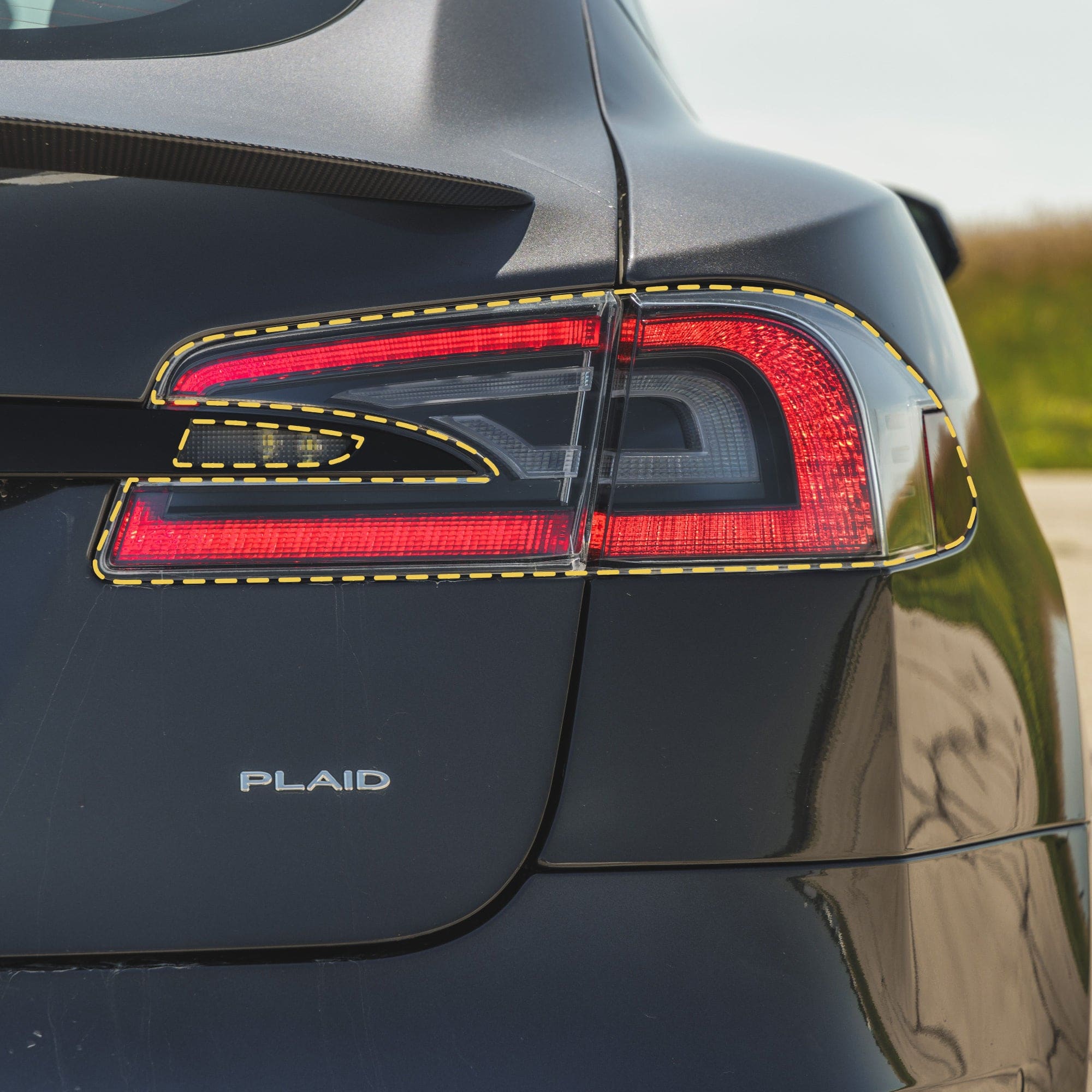car taillight outlined yellow tesla model tail lights smoke tint ppf