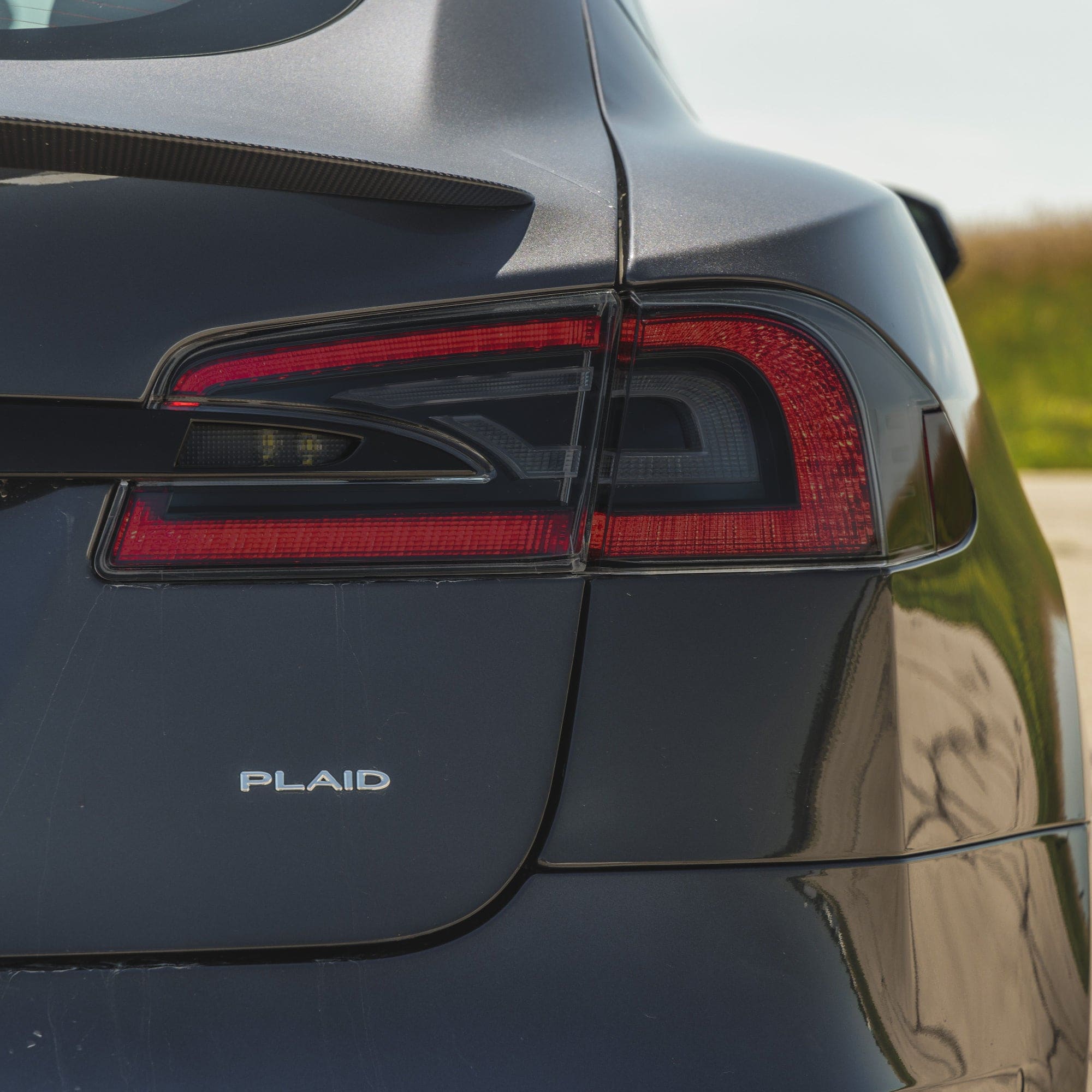 rear dark gray tesla plaid model tail lights smoke tint ppf