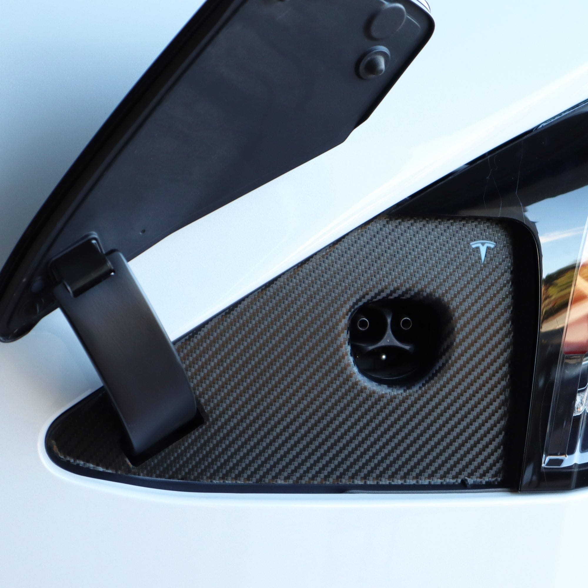 vinyl wrap charge port tesla model carbon fiber pattern