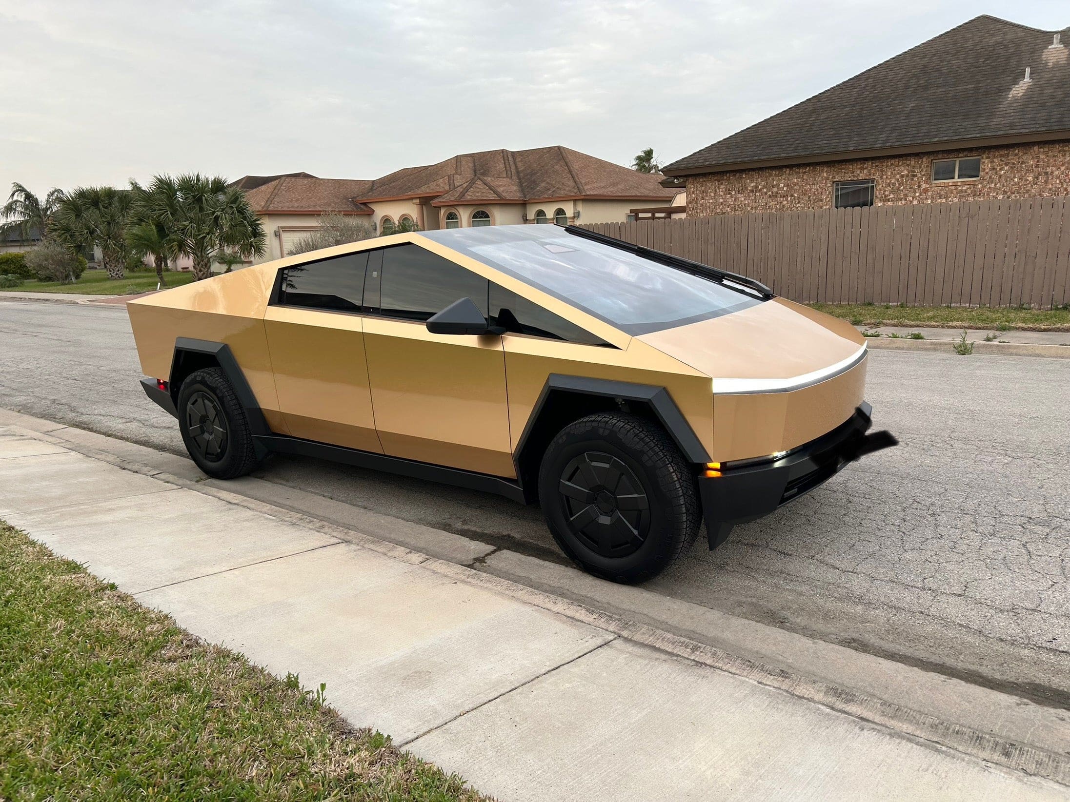 gold-wrapped tesla cybertruck milan gold color ppf