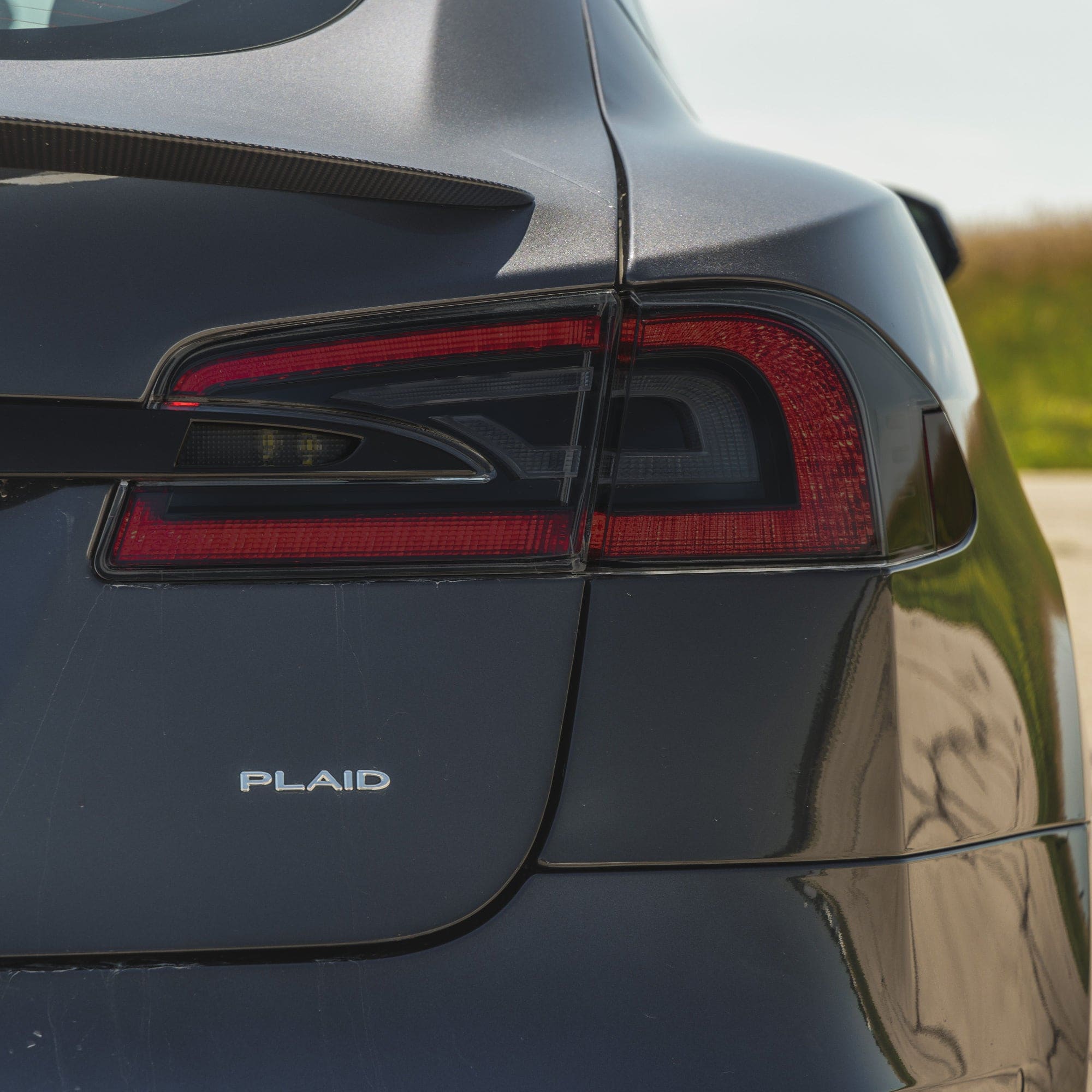 rear dark gray tesla plaid model tail lights smoke tint ppf