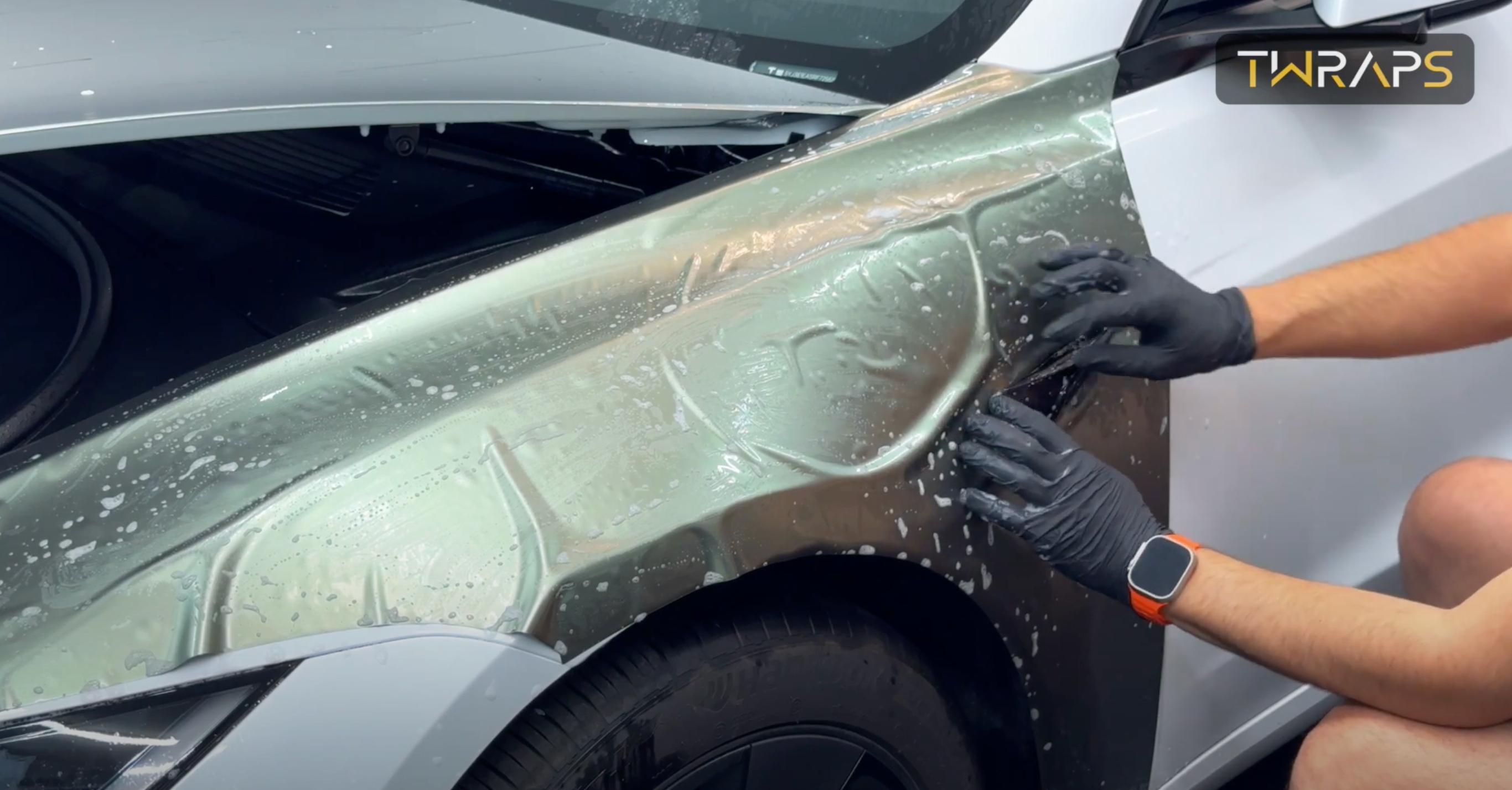 Load video: Wrapping a Tesla Model 3 Highland with TWRAPS Color PPF (DIY pre-cut kit)