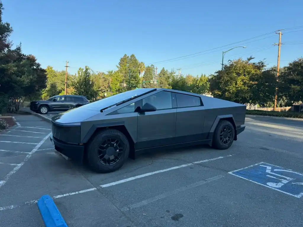 Tesla Cybertruck parked in a handicap spot.