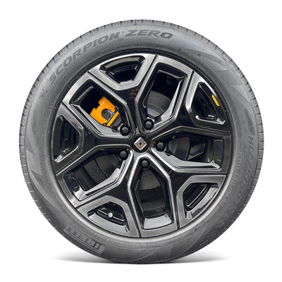 black silver rimmed tire yellow r1s chrome delete rivian r1t vinyl wrap