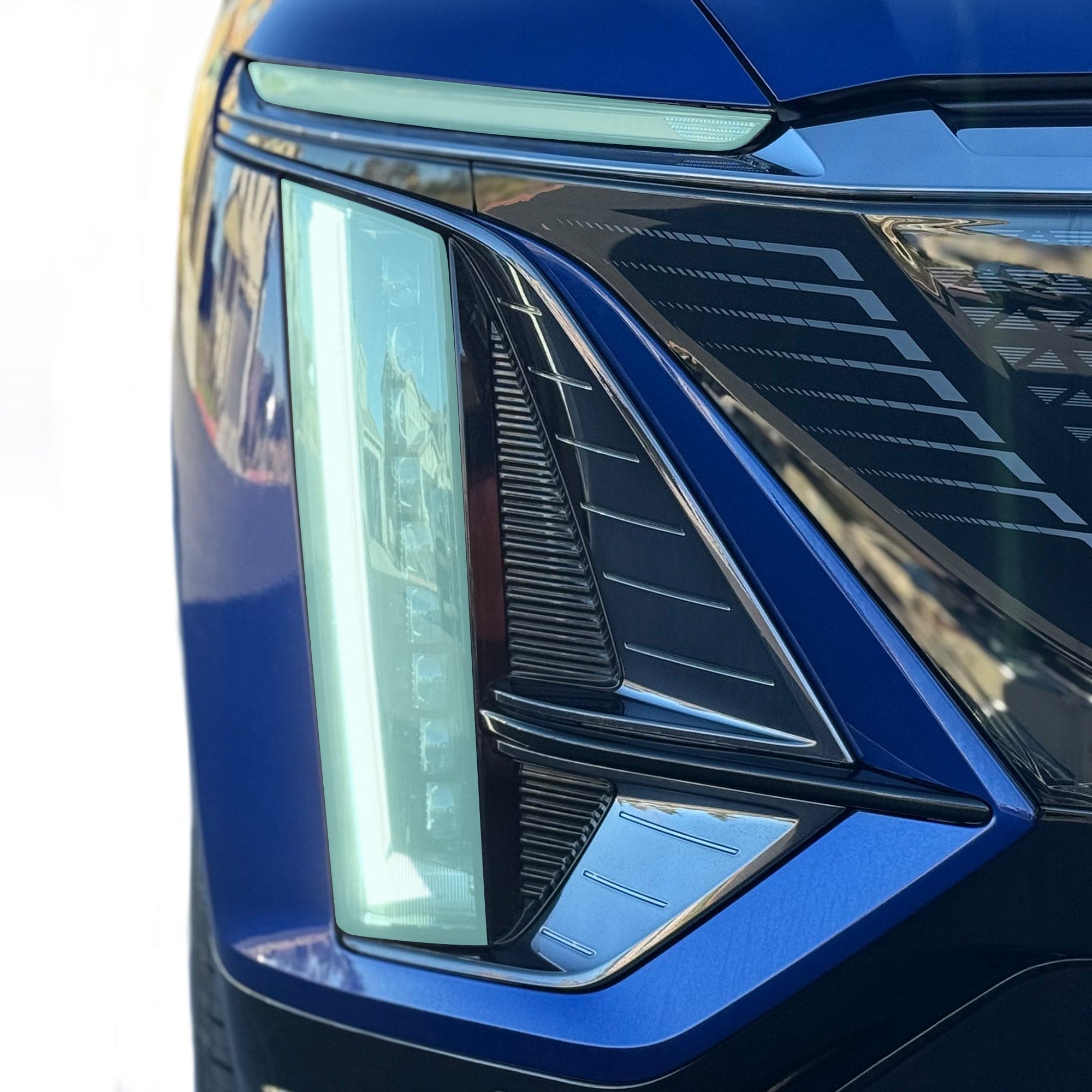 blue car headlight assembly cadillac lyriq paint protection film tint ppf easy diy