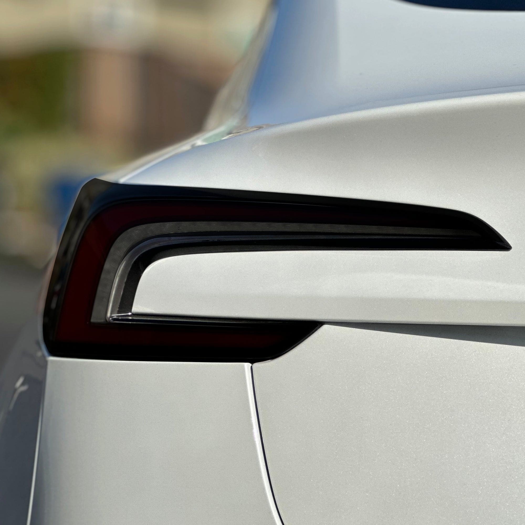 white car taillight smoke tint tesla model tail lights