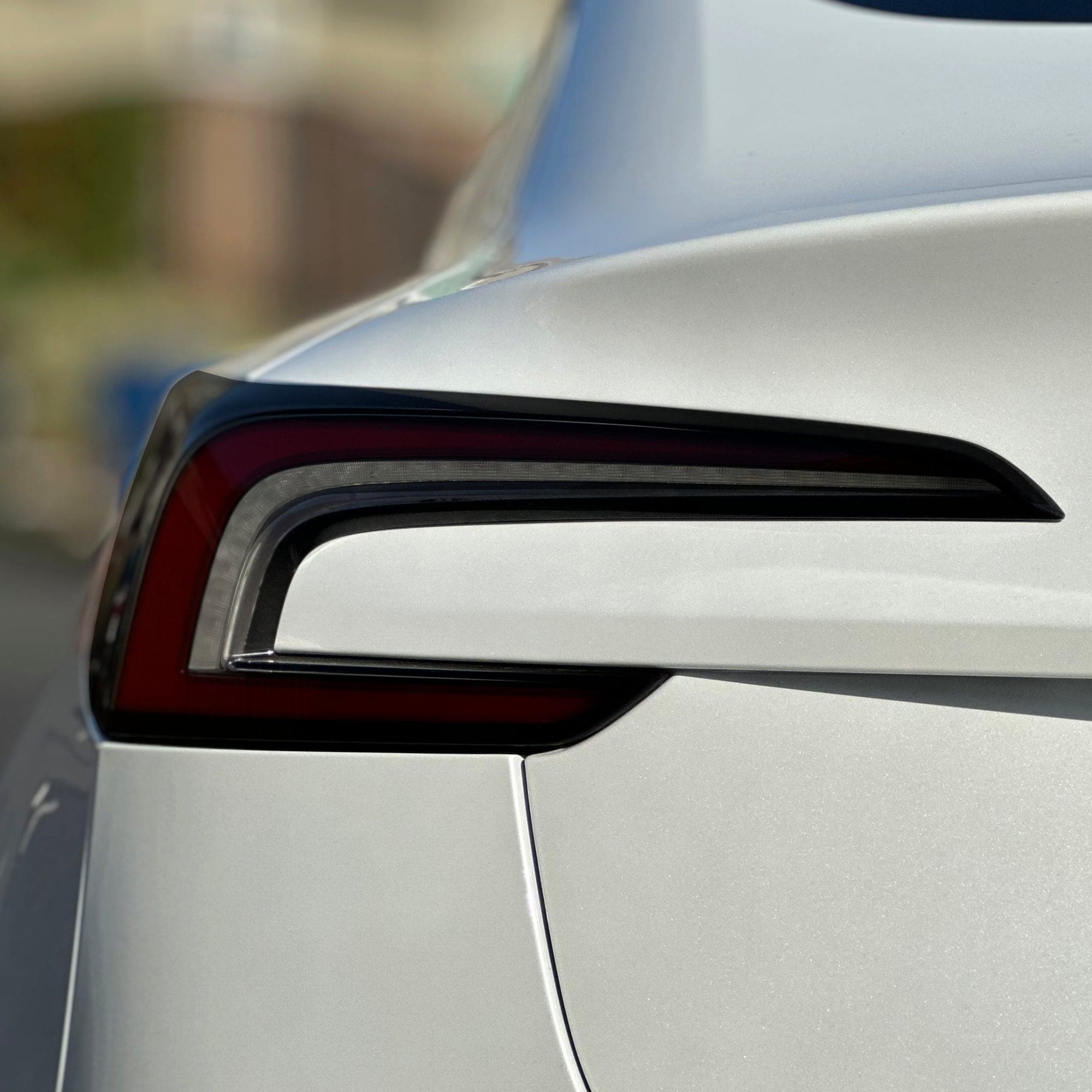 white car taillight smoke tint tesla model tail lights