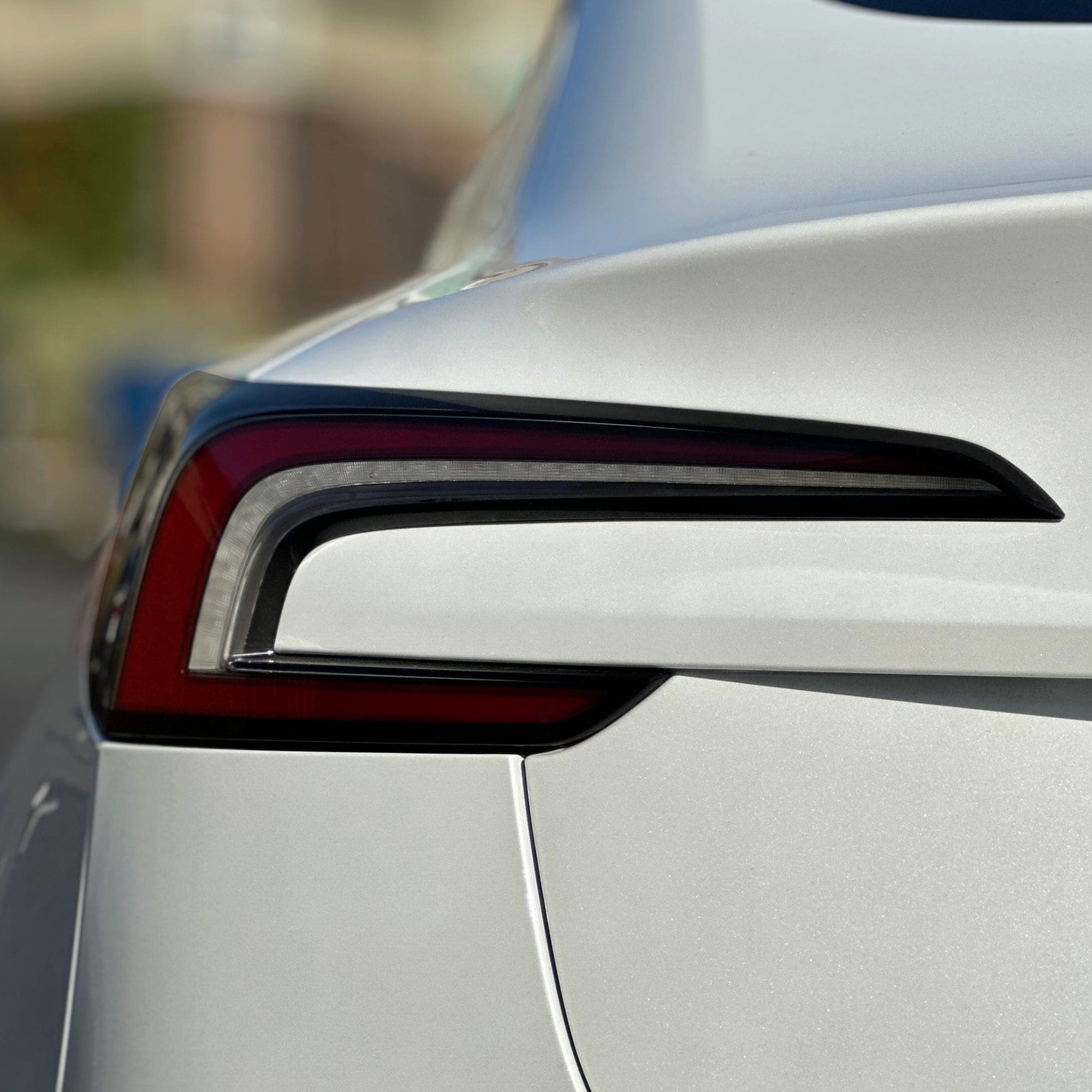 white car taillight smoke tint tesla model tail lights