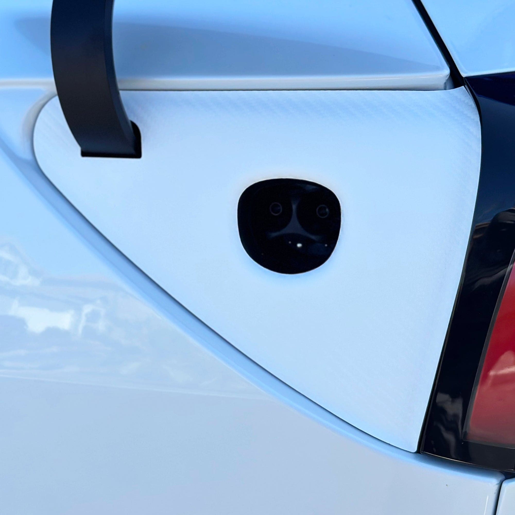 vinyl wrap carbon fiber charge port tesla model y juniper